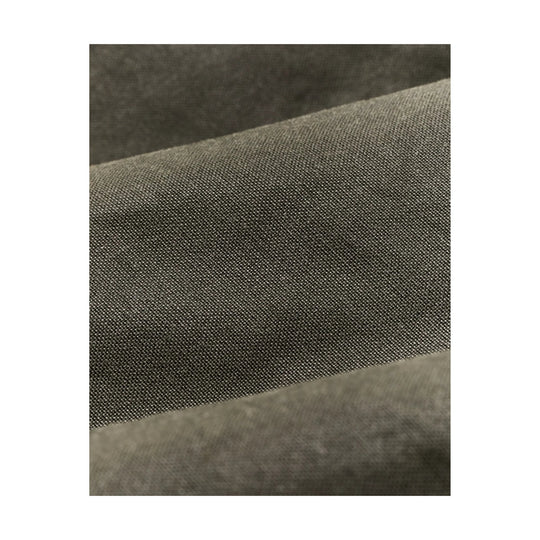 Close-up of olive-green textured jacket fabric