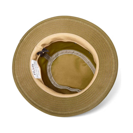 Tan wide-brim hat viewed from above with interior sweatband, chin tie, and FILSON label