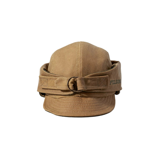 Tan canvas cap with a folded brim, strap band, buckle, and small visible FILSON logo