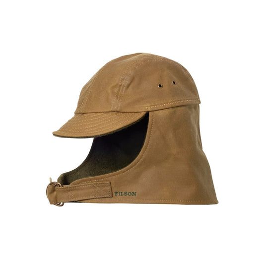 Tan canvas wildfowl hat with a short brim, ear flaps, and an adjustable chin strap