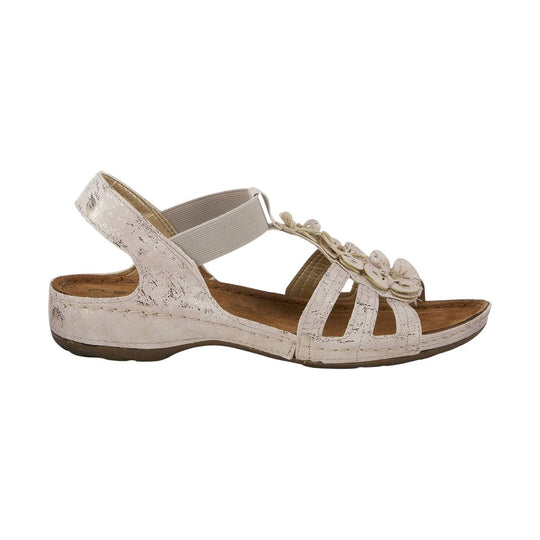 Beige slingback sandal with floral toe embellishment and low wedge sole