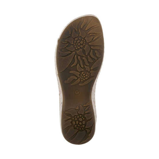 Brown sandal outsole with floral tread pattern and size 37 marking