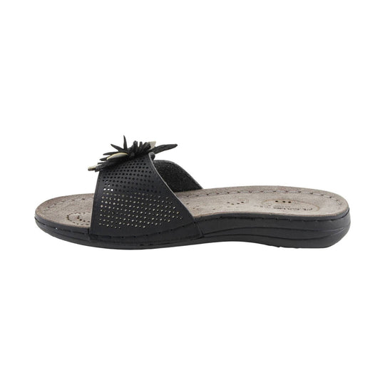 Black slide sandal with perforated upper and flower embellishment on the strap