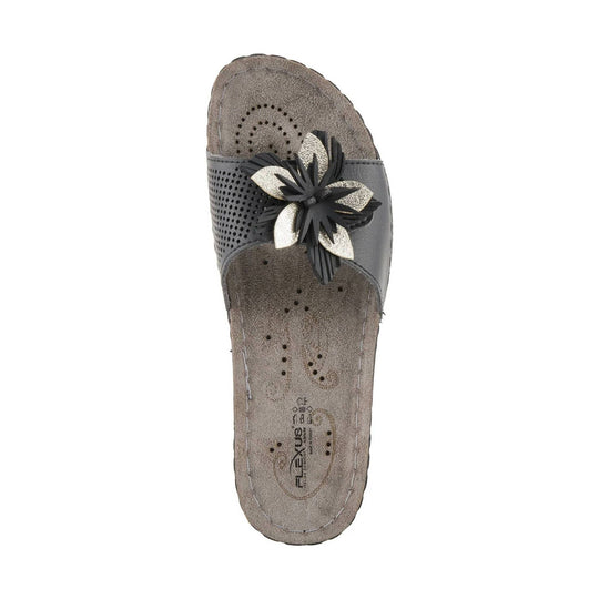 Gray slide sandal with a floral embellishment and perforated upper, viewed from above
