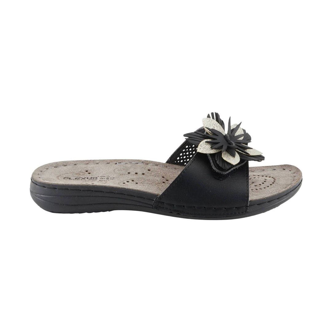 Black slide sandal with a floral upper and textured footbed