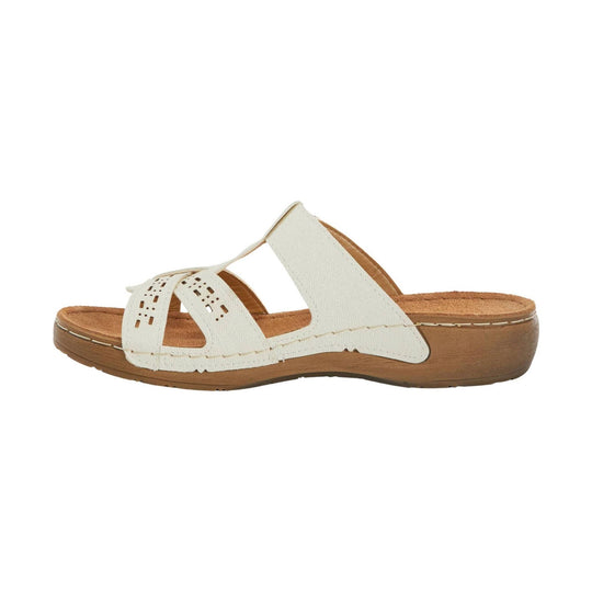White slip-on sandal with cutout straps and a cork-look wedge sole