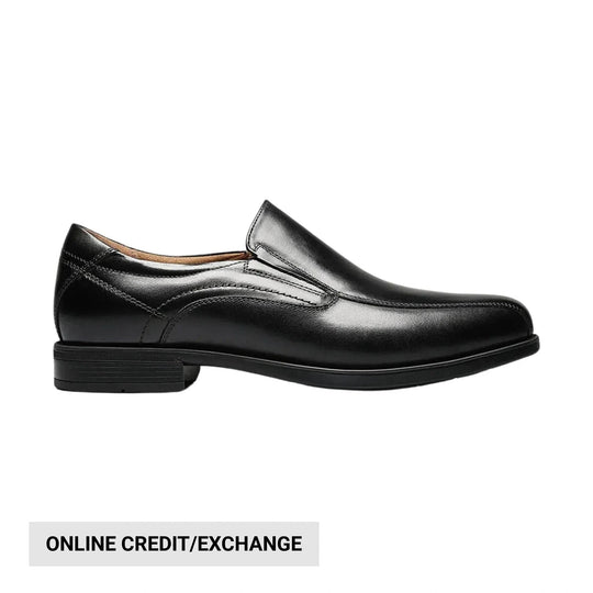 Black leather slip-on dress shoe shown in profile