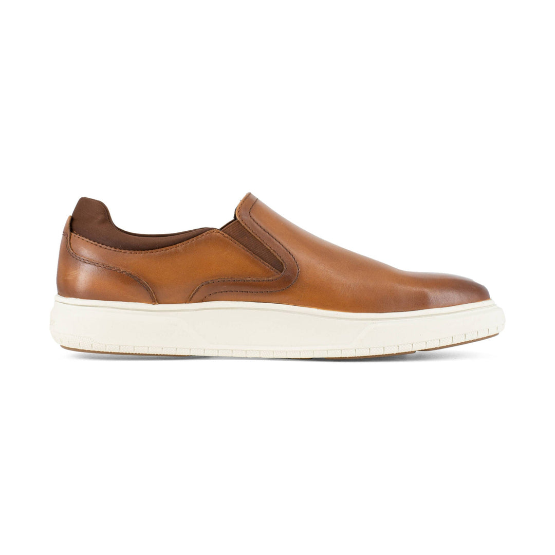 Brown slip-on work shoe with a white platform sole
