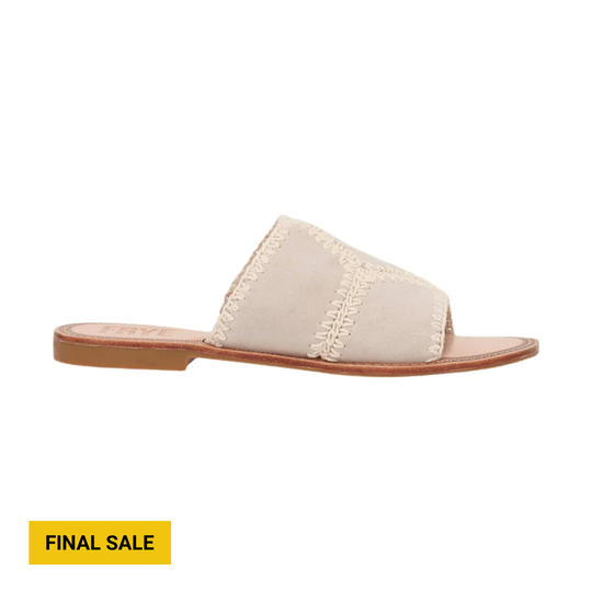 Cream crochet slide sandal with a flat tan sole and stitched edging, shown in side view. FINAL SALE text appears below.