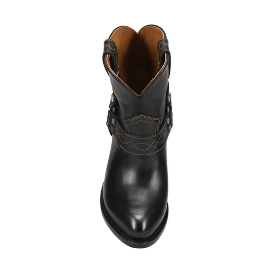 Black leather western boot with harness straps, contrast stitching, and a pointed toe, shown from the front