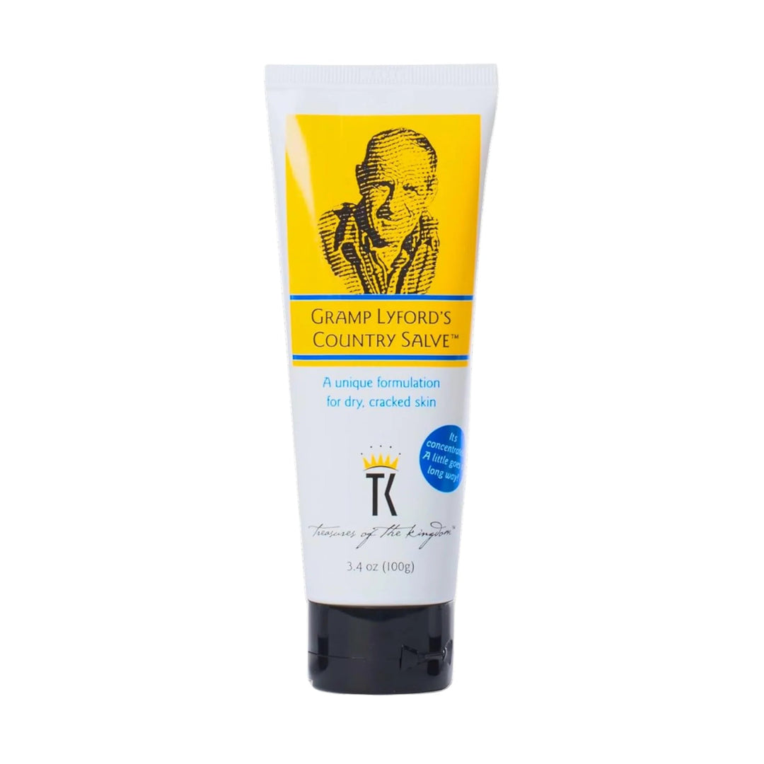 White tube of salve with yellow label, blue accents, and a black cap