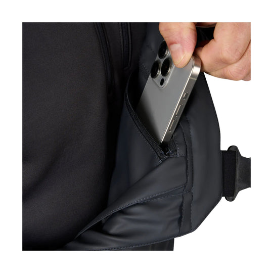 Black insulated bib pocket holding a silver smartphone