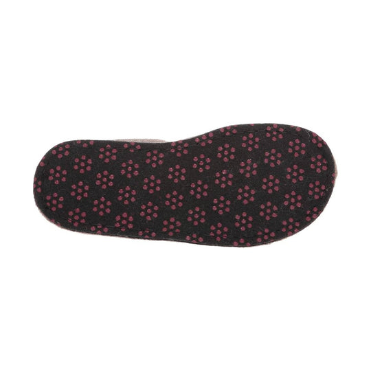 Black slipper sole with pink floral grip pattern
