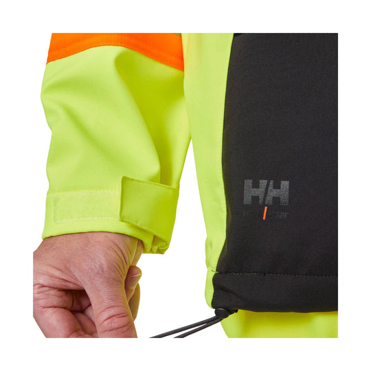 High-visibility yellow and black jacket sleeve with adjustable cuff and HH logo