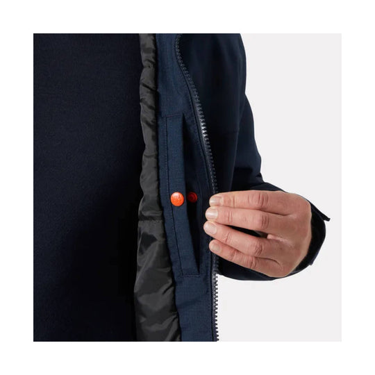 Close-up of a dark insulated jacket with a front zipper, interior storm flap, and orange snap closure