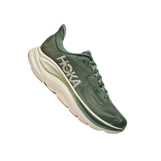 Green running shoe with white cushioned sole and HOKA logo on the side