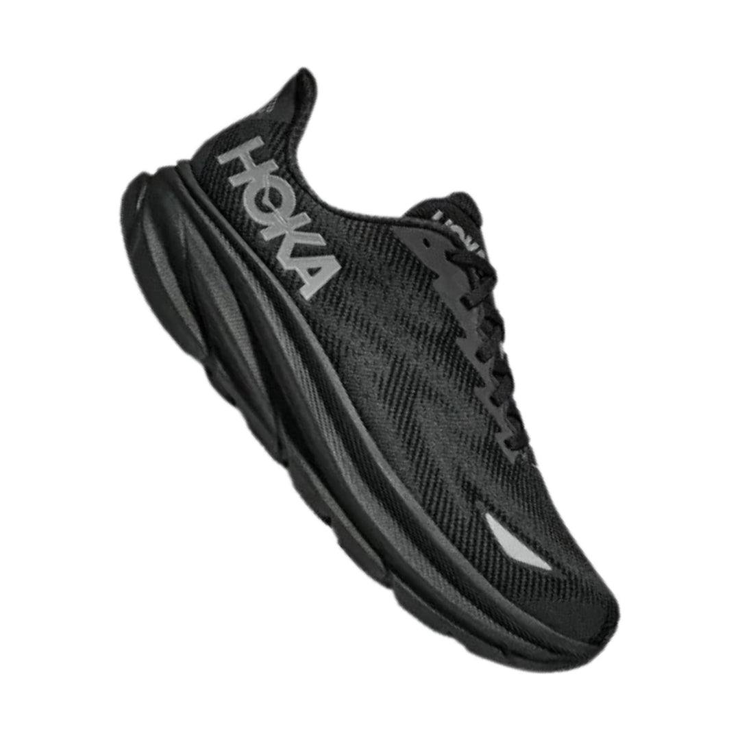 Black running shoe with HOKA lettering on the side
