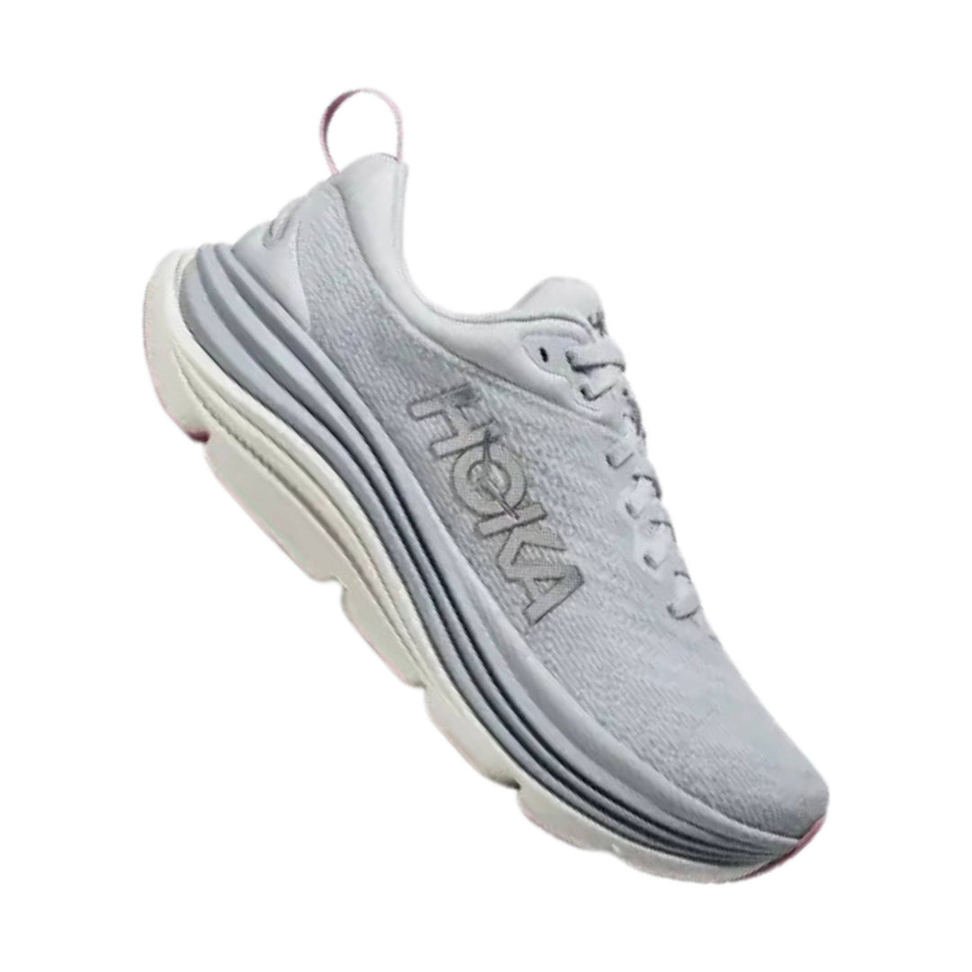 Light gray running shoe with thick cushioned sole and HOKA branding on the side