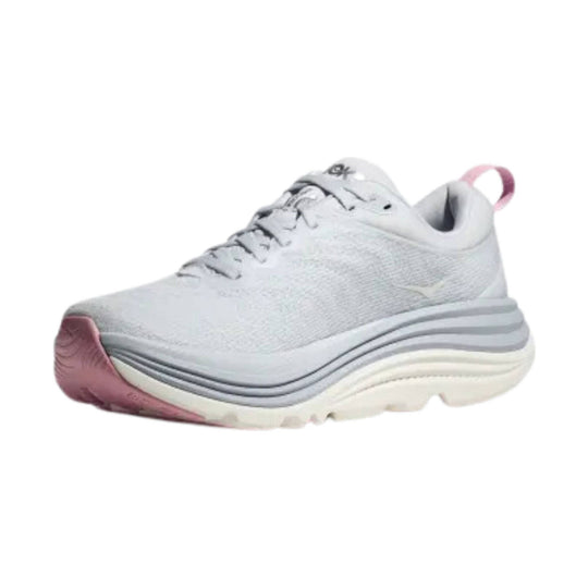 White running shoe with gray sole, pink toe cap, and pink heel pull tab
