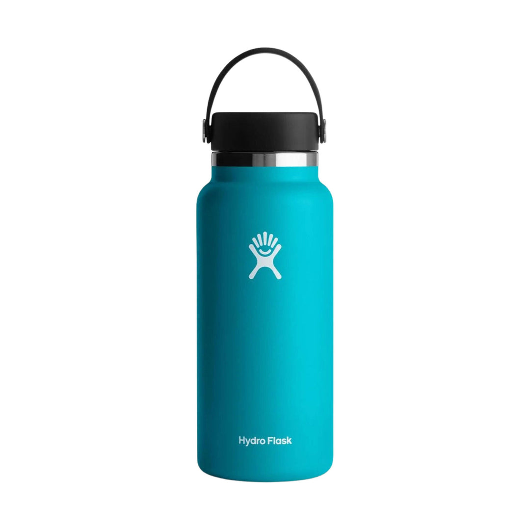 Turquoise stainless steel water bottle with a black handle cap and white logo