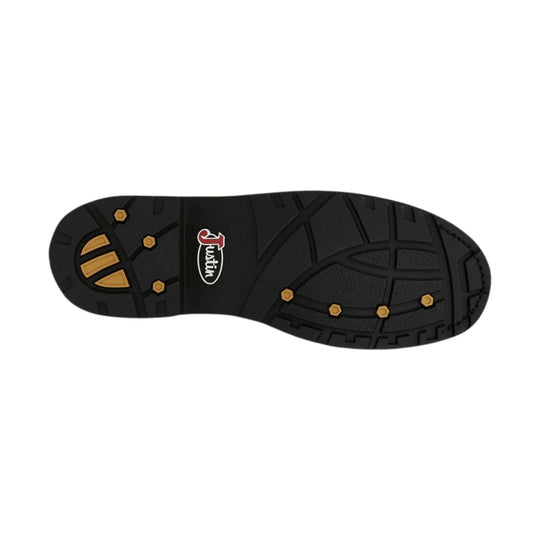 Black work boot outsole with lug tread and gold traction inserts, showing a Justin logo.