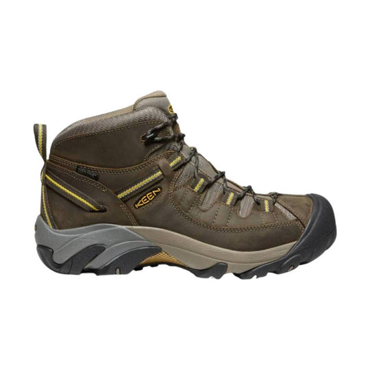Brown mid-height hiking boot with yellow accents, bungee laces, and a rubber toe cap