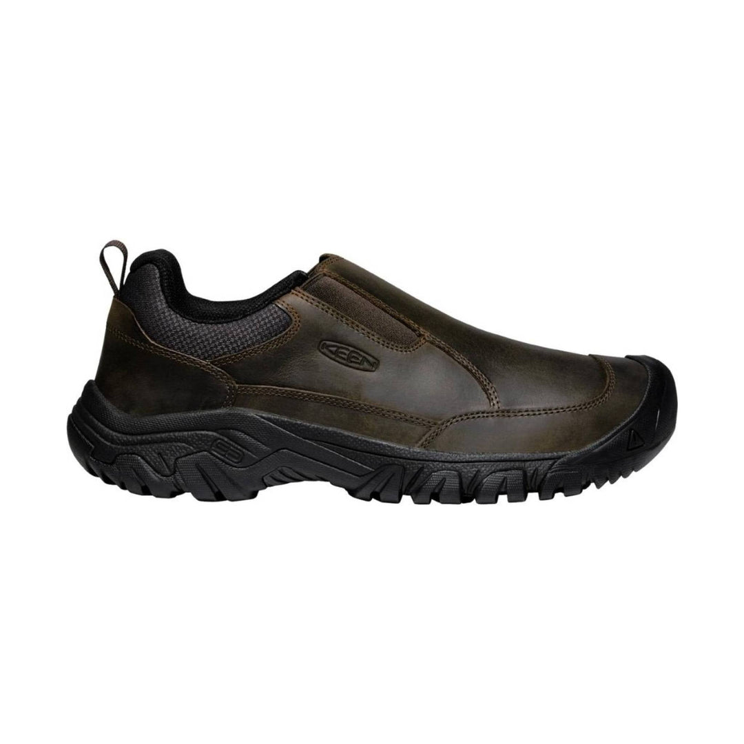 Brown slip-on shoe with black sole on a white background