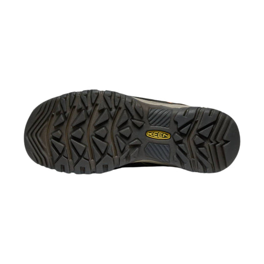 Black hiking shoe outsole with deep tread and a KEEN logo