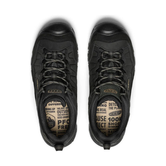 Black hiking shoes with bungee laces and cushioned collars, shown top down on a white background