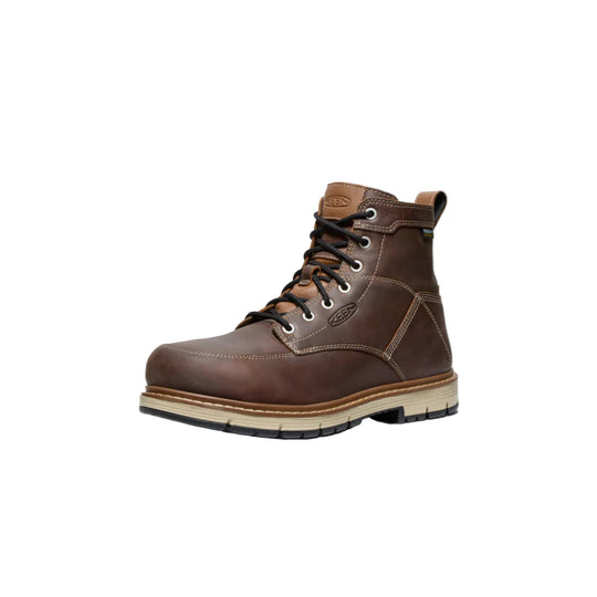 Brown leather lace-up work boot with a black sole and visible KEEN logos