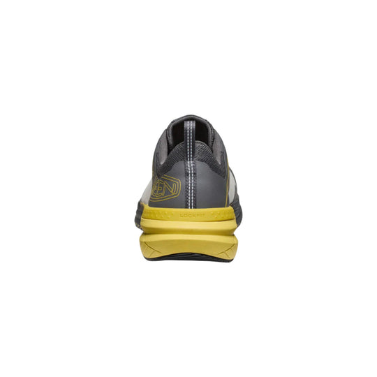 Rear view of a gray and yellow work shoe with a black heel tab and "LOCKFIT" text on the heel