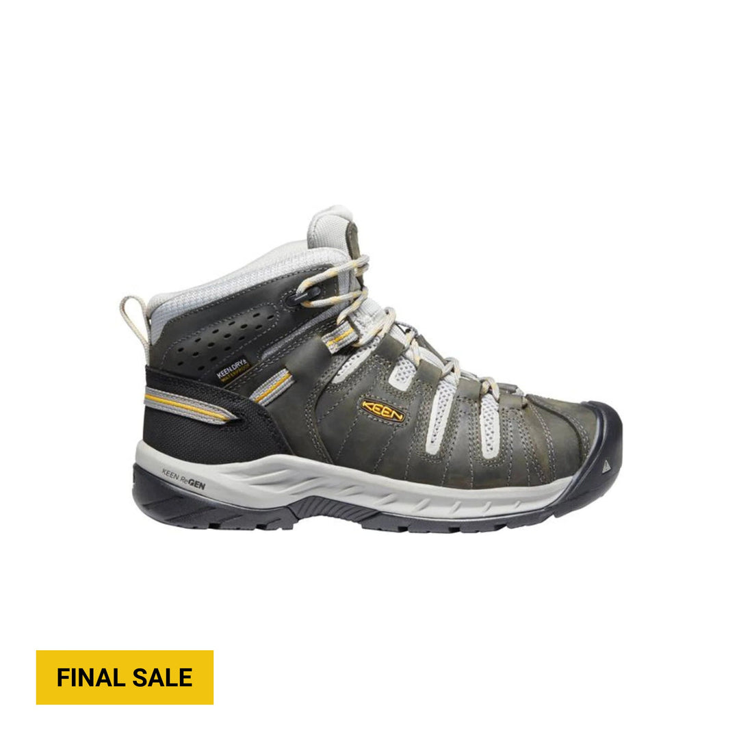 Gray mid-height waterproof work boot with white laces, black toe cap, and yellow final sale badge