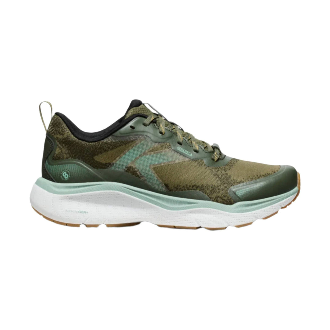 Olive green low-top hiking shoe with white platform sole and gum outsole