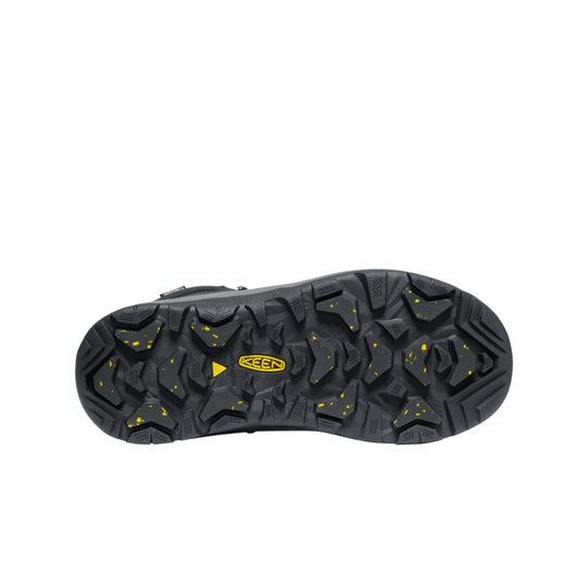 Black boot outsole with deep tread and yellow KEEN logo