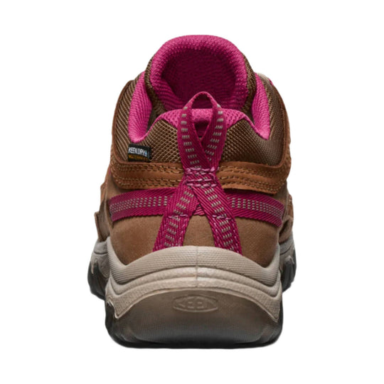 Brown and pink hiking shoe with mesh upper, heel pull loop, and visible KEEN label