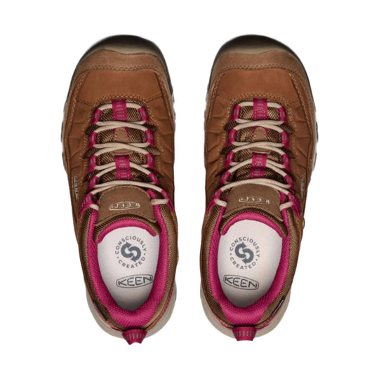 Brown and pink waterproof hiking shoes with bungee laces, top view