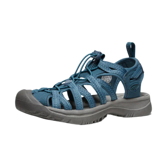 Blue closed-toe hiking sandal with bungee laces, side cutouts, and a gray sole