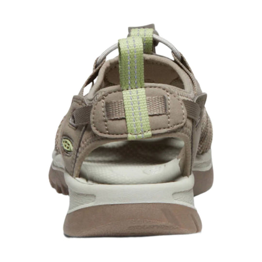 Taupe closed-toe hiking sandal with bungee heel loop and white midsole, rear view