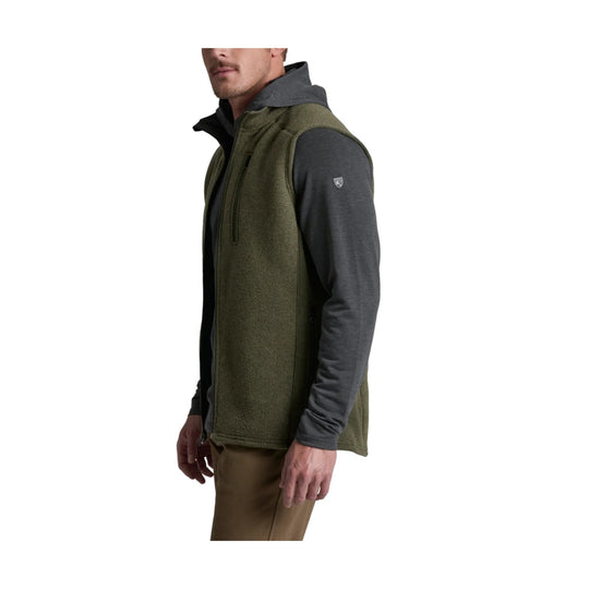 Olive fleece vest worn over a dark gray hoodie, shown in side view