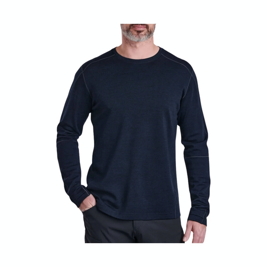 Dark navy long-sleeve crewneck shirt shown on a model against a white background