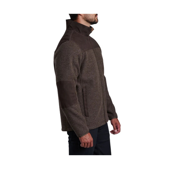 Brown zip-up fleece jacket with a high collar, chest yoke, and zippered side pocket