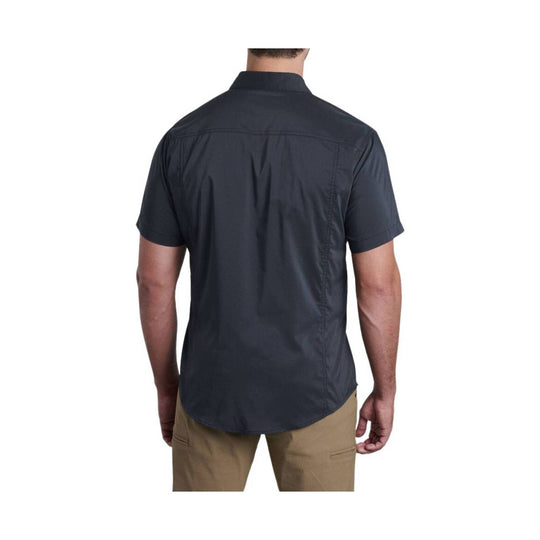 Black short-sleeve button-up shirt shown from the back, with a curved hem and collar