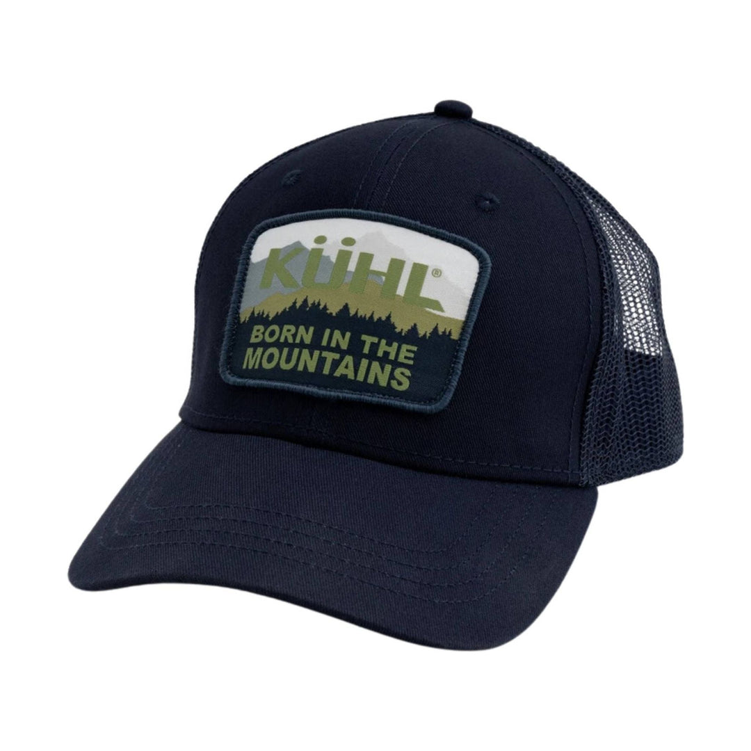 Navy mesh-back trucker hat with a front patch reading "KÜHL BORN IN THE MOUNTAINS"