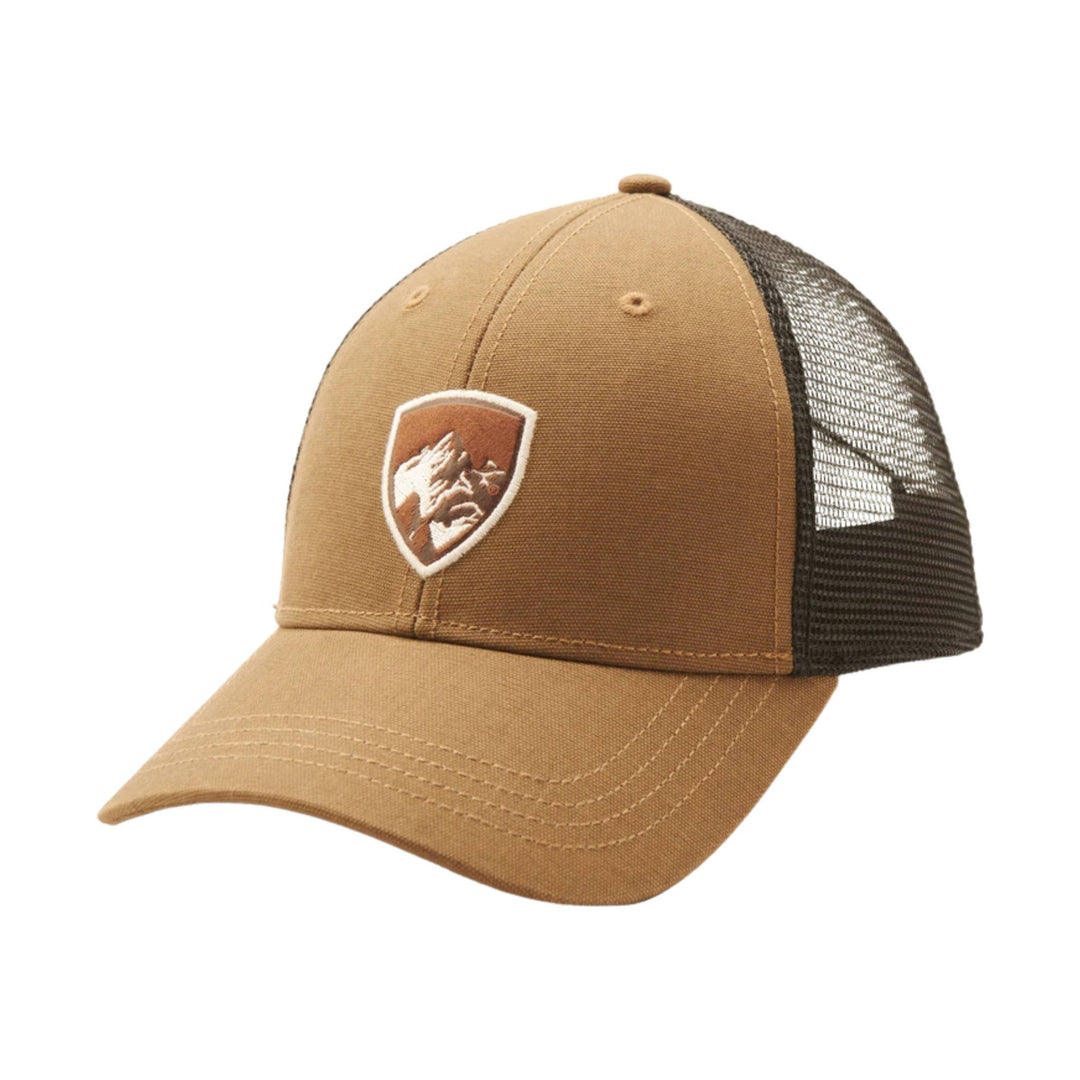 Tan and brown mesh trucker hat with a mountain patch on the front