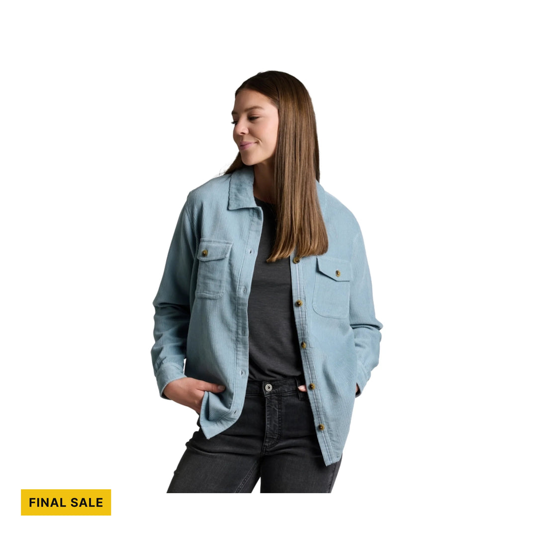 Light blue button-up corduroy shirt worn open over a dark top with a FINAL SALE label