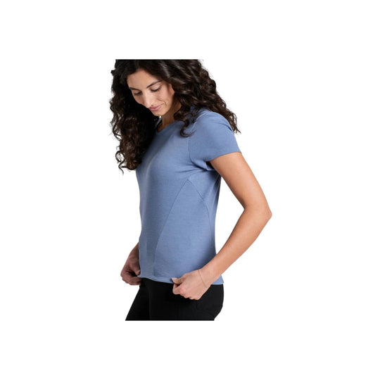 Blue short-sleeve fitted crewneck tee worn with black bottoms, shown in side profile on a white background