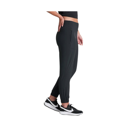 Black tapered jogger pants with zip pocket, ankle cuffs, and drawstring waist, shown in side view