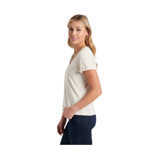 White V-neck short-sleeve T-shirt worn with dark jeans, side view