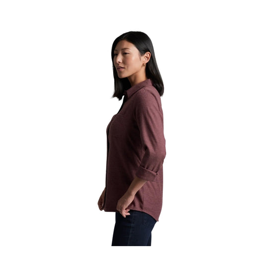 Women's burgundy button-up flannel shirt with rolled sleeves, shown in side profile