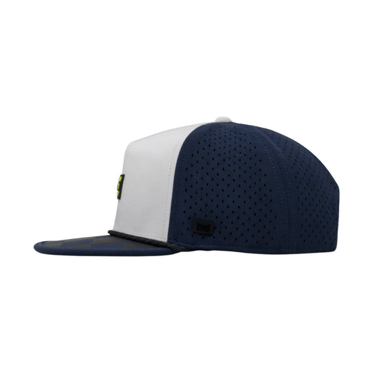Navy and white perforated snapback cap with a flat brim